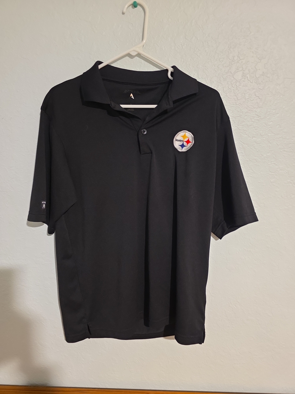 Antigua Black Golf Polo with Pittsburgh Steelers Patch